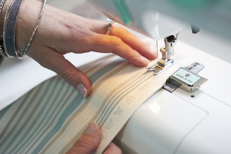 School of Sew student sewing curtains